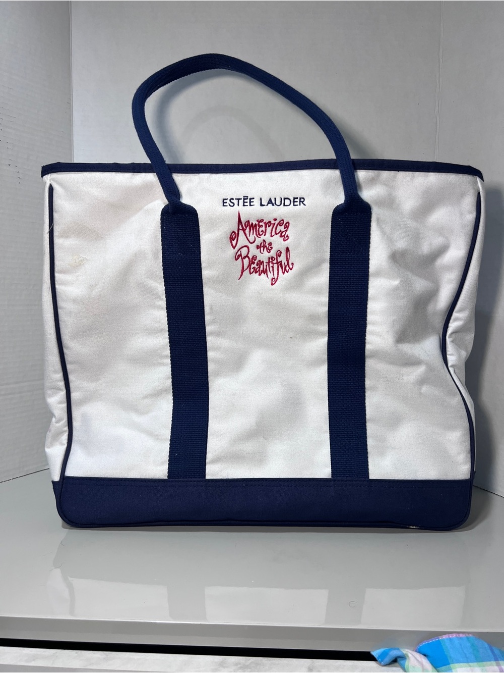 Estee Lauder White & Navy 'America the Beautiful' Canvas Tote